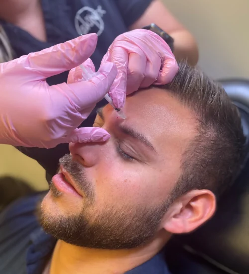 skinFX male patient receiving botox cosmetic on forehead at our Clinton location near Ogden, UT